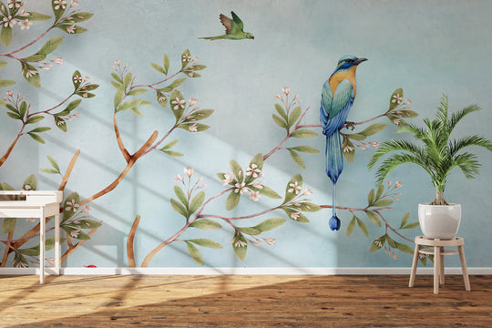 Bird Wallpaper for Living Room & Bedroom – Premium 3D Botanical Wallpaper with Blue and Orange Exotic Birds, Flowering Branches and Sage Green Leaves on a Soft Blue Background | Arihant Arts