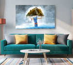 Living room with teal sofa, colorful cushions, and a large abstract painting on the wall.